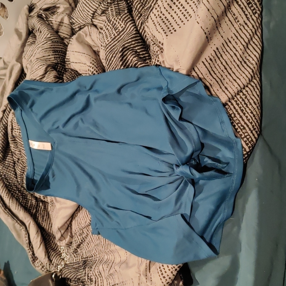 Teal sleeveless shirt Sold